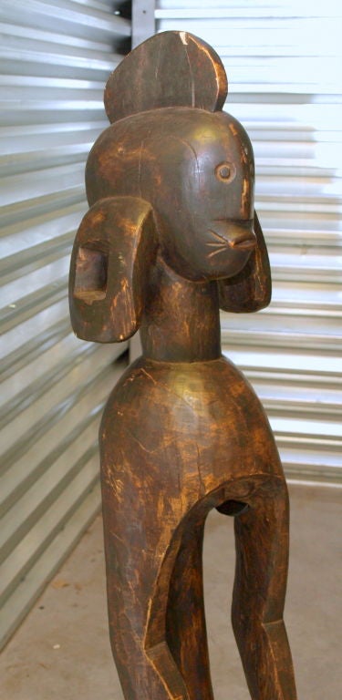 An important African Statue from the Mumuye Tribe. Standing abstract figure (this piece is very much from where the cubistic movement and figures were derived) with arms down, held away from sides; Mohawk-like hairstyle; exaggerated ear lobs.<br