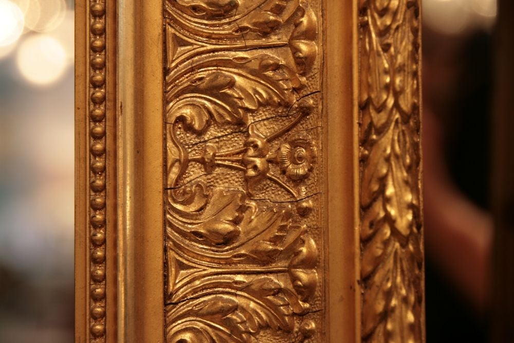 Striking antique French Napoleon III period gold leafed frame.