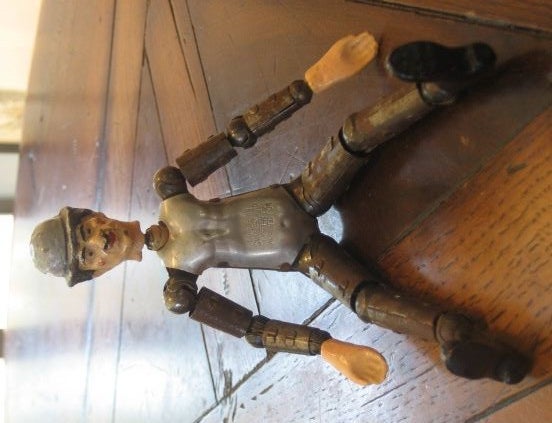 Vintage Bucherer dolls modeled after Charlie Chaplin & Laurel from Laurel and Hardy. Each torso is stamped 