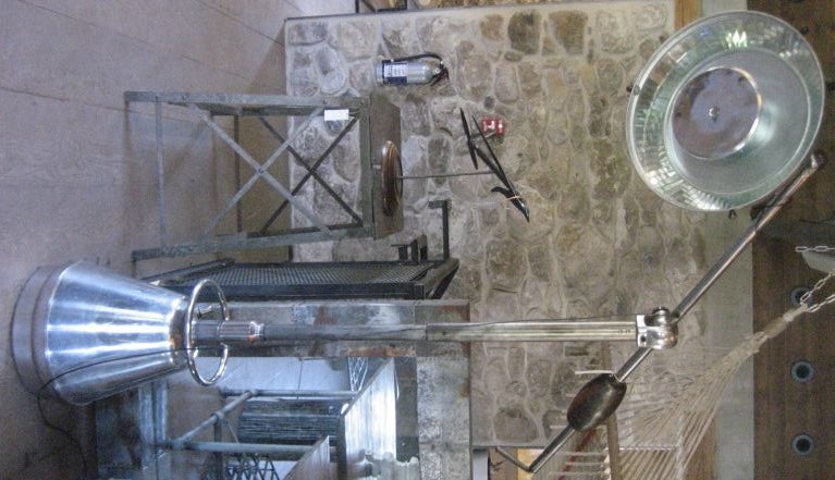 Vintage surgical lamp from the 1930's or 1940's. Lamp head rotates with the extended arm.