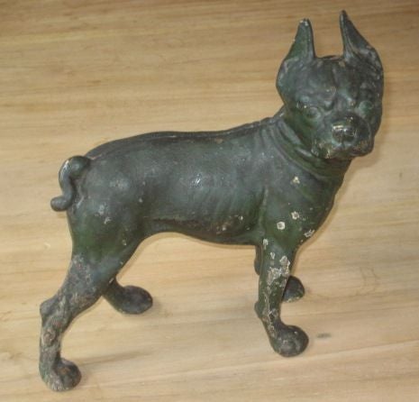 Vintage Boston Terrier cast from iron and painted green with a beautiful patina.