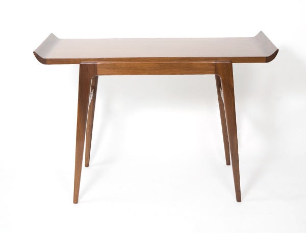 Pair of sculptural walnut consoles attributed to Jens Risom.