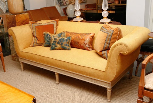 Jansen carved and painted sofa in the Louis XVI style.