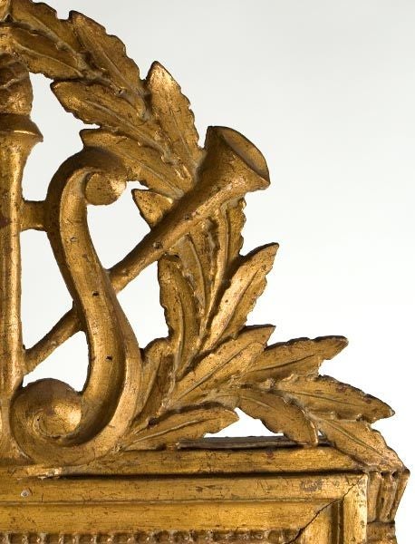 Gilded and carved late 18th century French mirror with lyre and acanthus leaf detail.