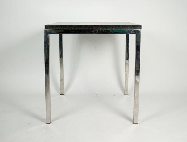 Pair of contemporary chrome side table with black granite tops.