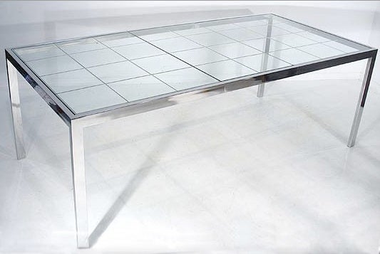 Chrome extendable glass top dining table, c. 1970's, possibly designed by Pierre Cardin. Beveled etched grid detail through glass top. Table has extra leaf extension with extra glass top piece.

Leaf is 20