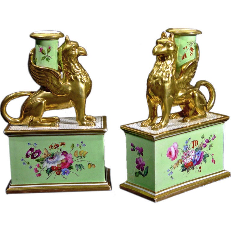 A Pair of Worcester Porcelain Griffin Candlesticks