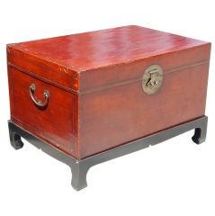 Antique Cordovan leather trunk with stand.