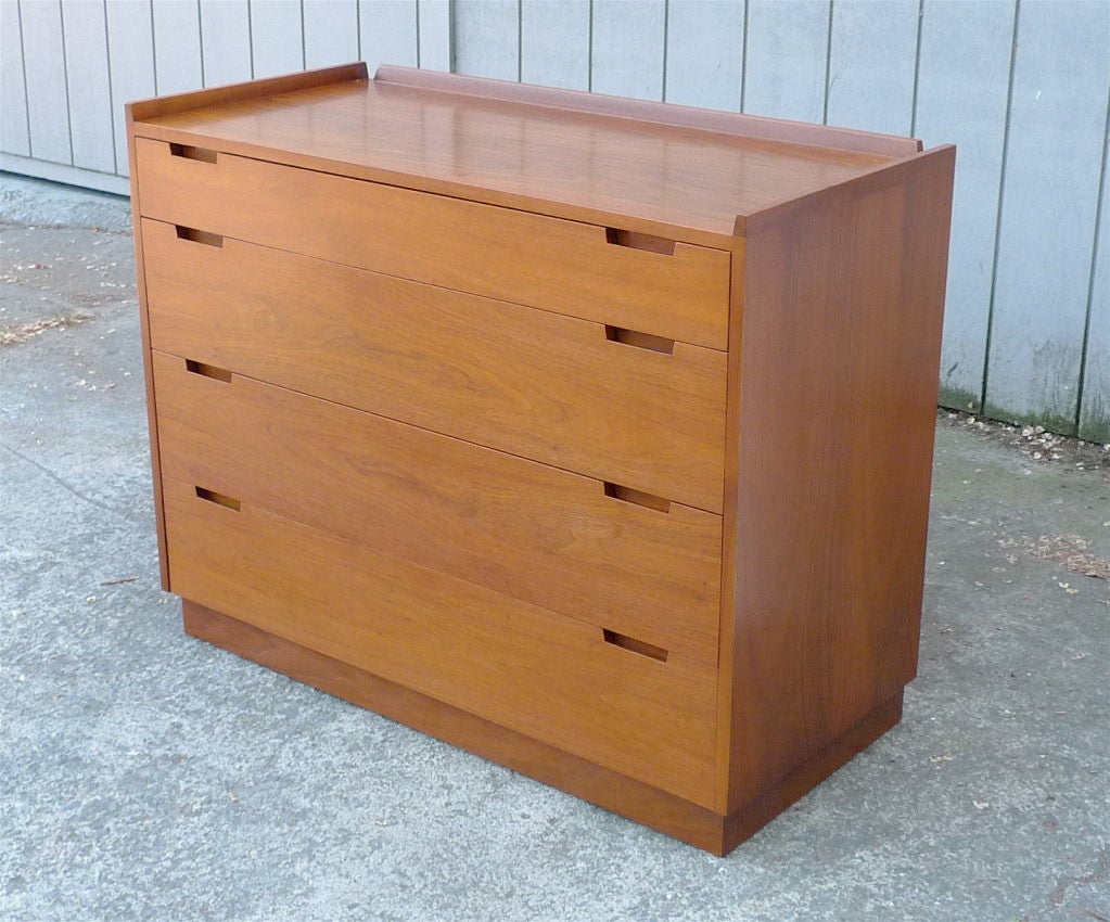 Walnut dresser with recessed, dust-proof pulls and plinth base.<br />
Grand Rapids Bookcase and Chair Company commissioned for their Hastings Square Collection, William Pahlmann, head director at Lord & Taylor in Manhattan and famed author of the