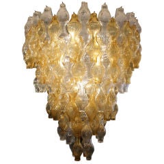A large blown clear and amber glass component ceiling light.