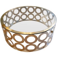 A large circular occasional coffee table