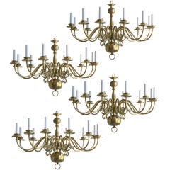 A set of 4  Baroque style brass 12 arm chandeliers