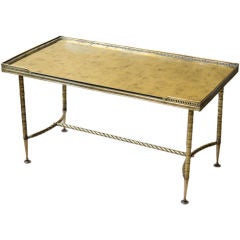 A brass and  gold mirror  top coffee table