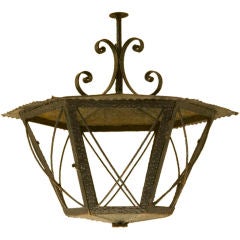 Large black painted hexagonal hammered iron and tole lantern