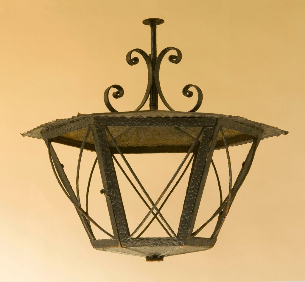 Large black painted hexagonal hammered iron and tole lantern