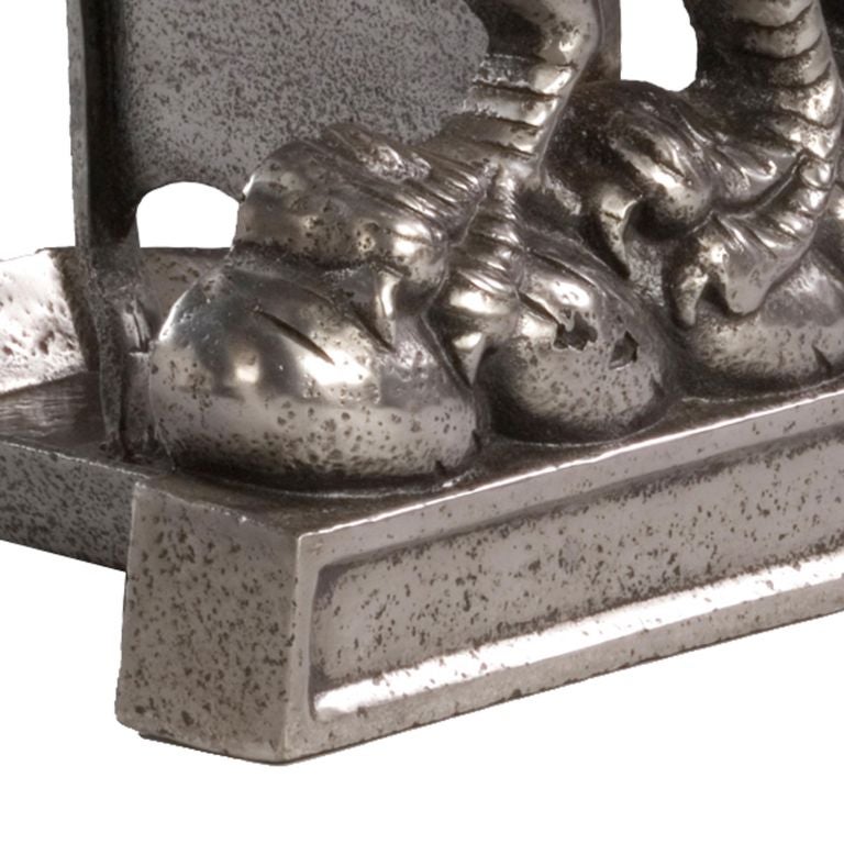 A large-scale pair of early Victorian polished cast iron bootscrapers fashioned as wyverns.<br />
<br />
Height of first wyvern:  28 ¾ in (73 cm)<br />
Height of second wyvern:  30 in (76 cm)<br />
Width of first wyvern:  17 ¾ in (45 cm)<br