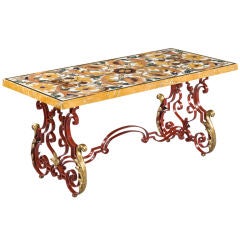A PIETRE DURE PANEL MOUNTED AS A LOW TABLE