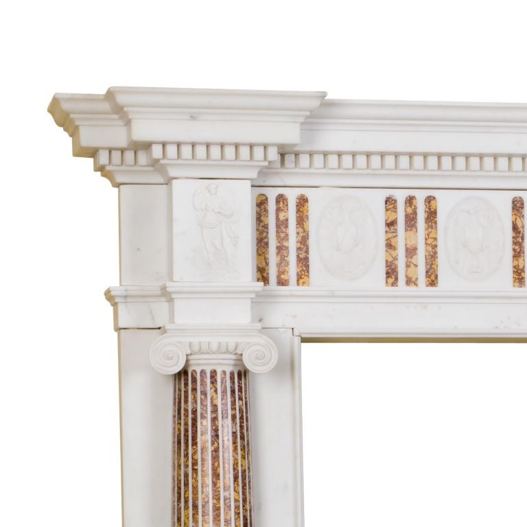 Catalogue Text:<br />
A fine Georgian statuary and brocatello inlaid marble chimneypiece with three-quarter column jambs and Ionic capitals beneath carved Terpischore and and Muses, the inlaid frieze with a carved centre tablet of 'Diana the