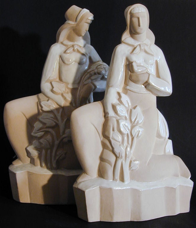 This very rare pair of terracotta sculptures by Phoenix pottery, probably sculpted by Geza de Vegh, date from the 1930s and are strongly reminiscent of the stylized social realism promulgated by the Works Progress Administration (WPA). Each piece is