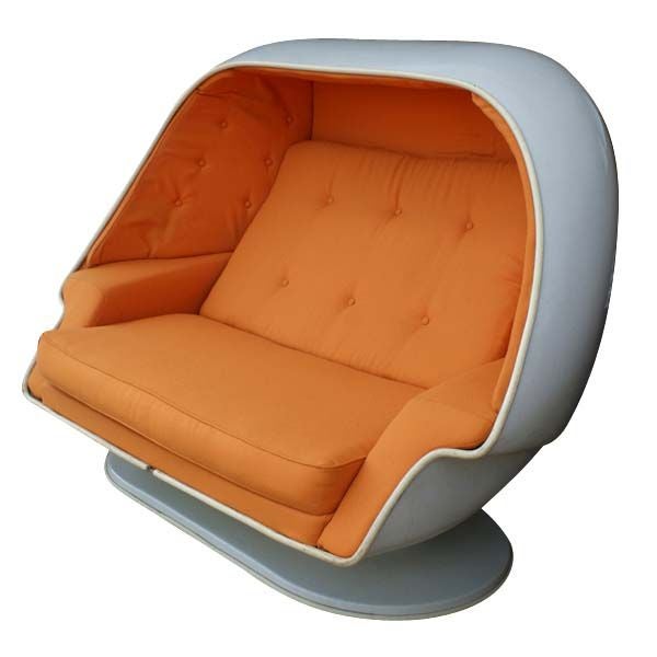 Two person Alpha stereo pod egg chair with an ottoman.  Made in the 1960's by Lee West Inc.  Original fiberglass shell with new orange Knoll upholstery. Configured to be compatible with contemporary technology including MP3.  The chair measures 67