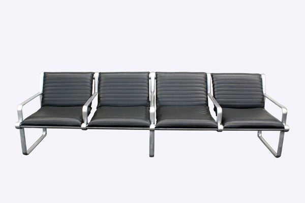 A four-person Mid-Century Modern sofa designed by Bruce Hannah and Andrew Morrison for Knoll. Part of the Morrison-Hannah Collection which debuted in 1973 and won an Industrial Design Award. The sofa is supported by an extruded aluminum frame and