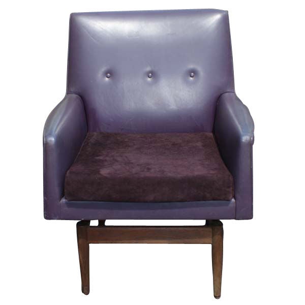 A pair of Jens Risom chairs on swivel bases. Upholstered in their original 1960s purple vinyl with new purple suede cushions. The bases are walnut.
