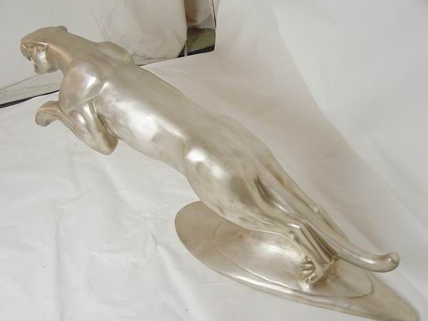 leaping jaguar statue