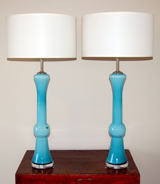 Space age design from the 1960s with Aqua Blue cased glass and nickel plated solid brass hardware.  Very tall and slender with crisp architectural lines.  They remind me of the Seattle Space Needle, complete with Observation deck nearly half way up
