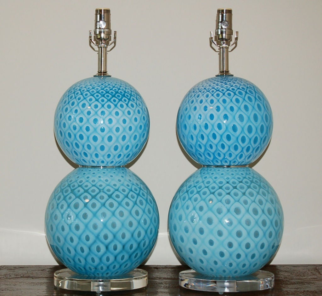 Our very last pair of vintage Murano table lamps by Giorgio Ferro in classic stacked ball design.  Beautiful MARINE BLUE Murano glass with Giorgio Ferro's signature peacock feather design.

These lamps measure 24 inches from tabletop to socket