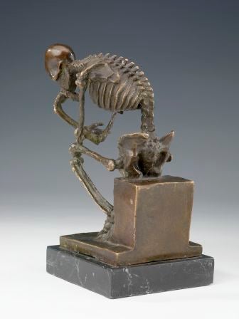 ‘Penseur’ (after Rodin): a very unusual bronze depicting a human skeleton seated in the classic pose adopted by Rodin’s ‘The Thinker’, the finely modelled figure seated on a bronze plinth, the whole mounted on a marble base.