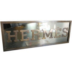 Vintage Hermès store display sign.