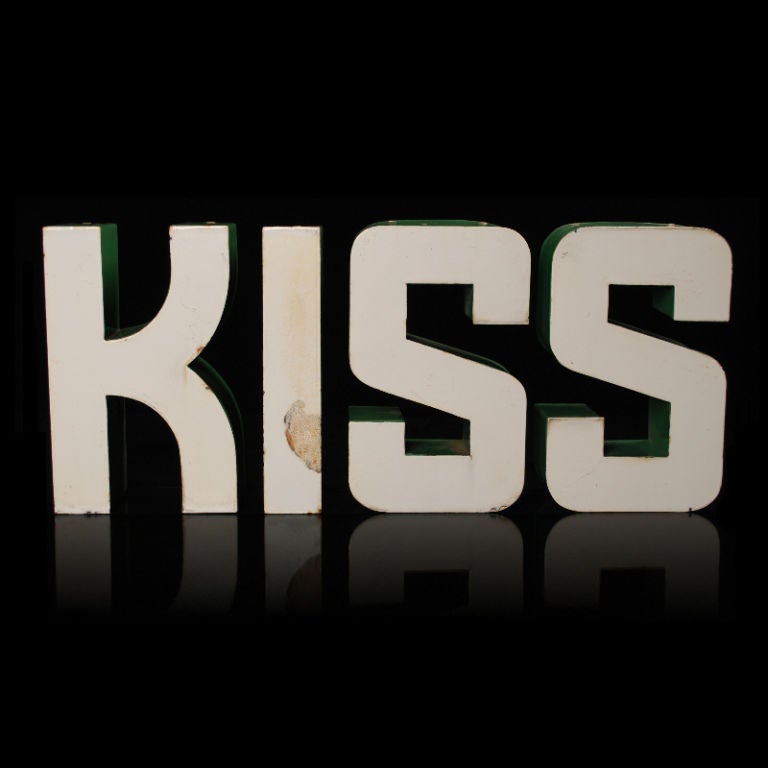 This is a great set of vintage two-tone porcelain letters that spell KISS. The faces are white and the deep sides are green, which makes this perfect for that Irish person you know, that always wants to be kissed.