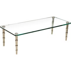 A Maison Bagues Polished Chrome and Glass Low Table