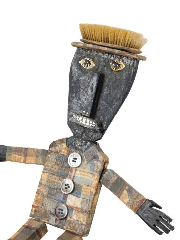 Harvey Peterson <br />
Assemblage of madras fabrics, wood and old brush.<br />
Jointed figure.