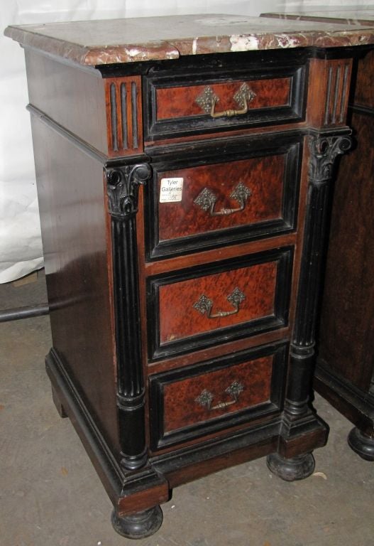 Pair of 19th Century Renaissance Revival Ebony & Burlwood Marble Top four-drawer bedside tables, attributed to Herter Bros,