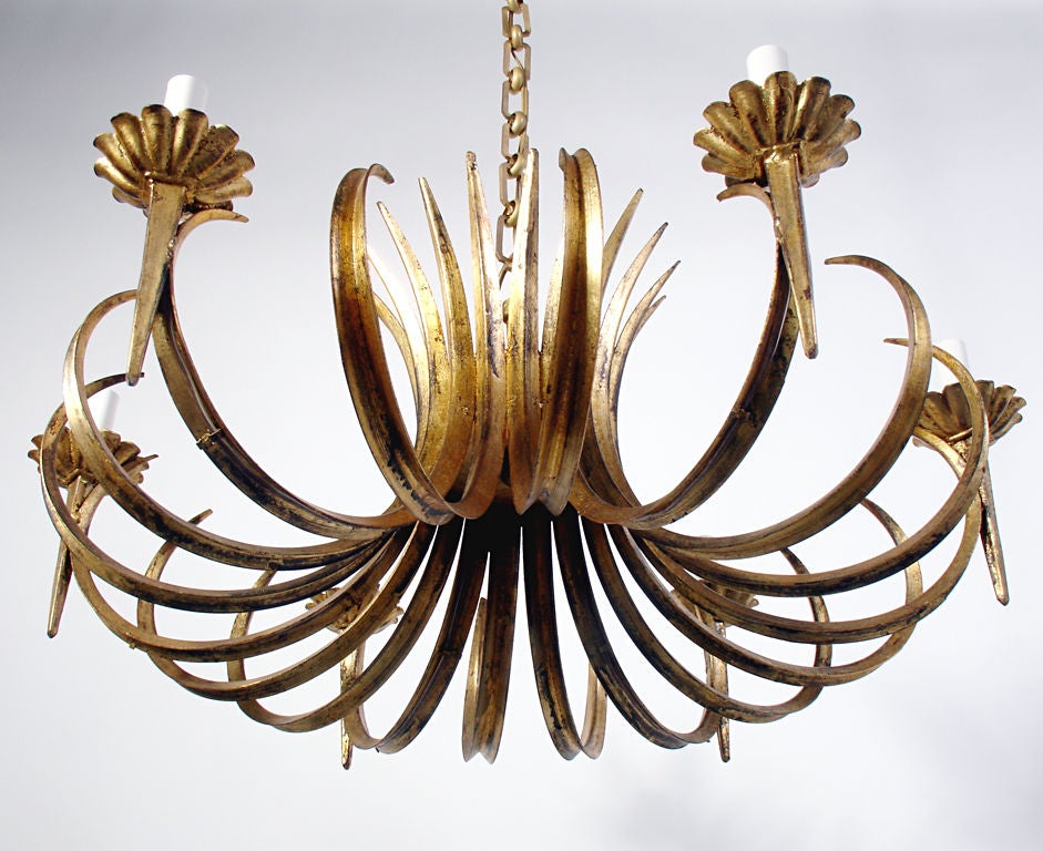 Sculptural Gilt Chandelier, Made In Spain, circa 1950's. This chandelier would fit seamlessly into a wide range of interiors from traditional to ultra modern. The height measurement noted in this listing is for the body of the chandelier only. The