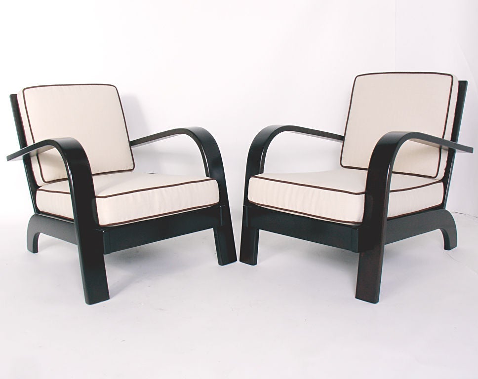 Pair of Streamlined Lounge Chairs, designed by Russel Wright for Conant Ball, circa 1940s.