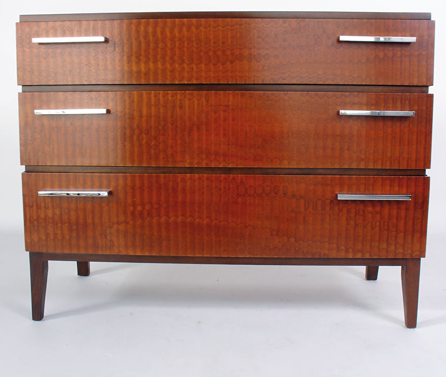 Art Deco Chest or Dresser designed by Donald Deskey for his own company, AMODEC, circa 1930's. The exotic burled wood has incredible graining. This piece is a versatile size and can be used as a bedroom chest or for storage in a living area. Please