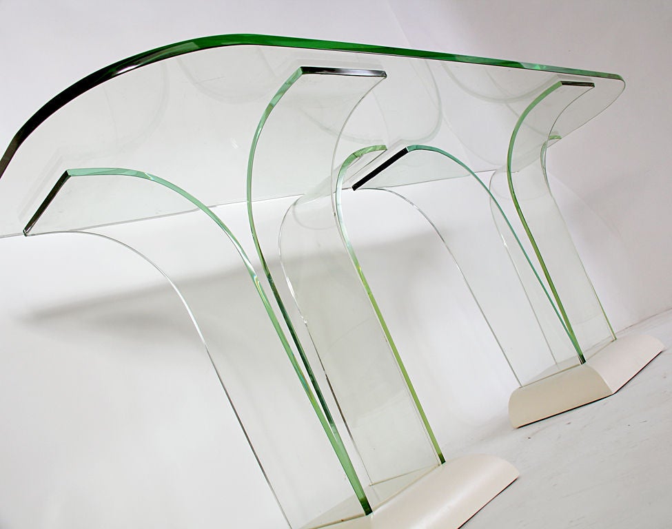 Sculptural Glass Console Table, designed for the Modernage Company of NYC, circa 1940s. This table retains all of it's original glass, which is that rich light green color at the edges. Modern glass is much darker and does not have the same look to