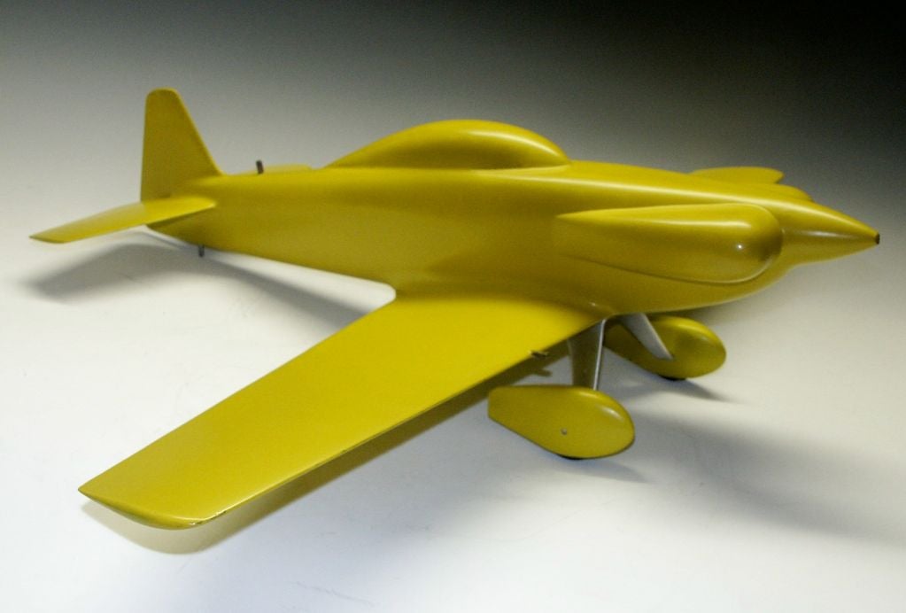 This is a beautiful streamline design model of a racing airplane , sold together with the engineering drawing specifications.  It was designed as an entry for the Good Year Trophy Race.  A sexy streamlined sculpture.