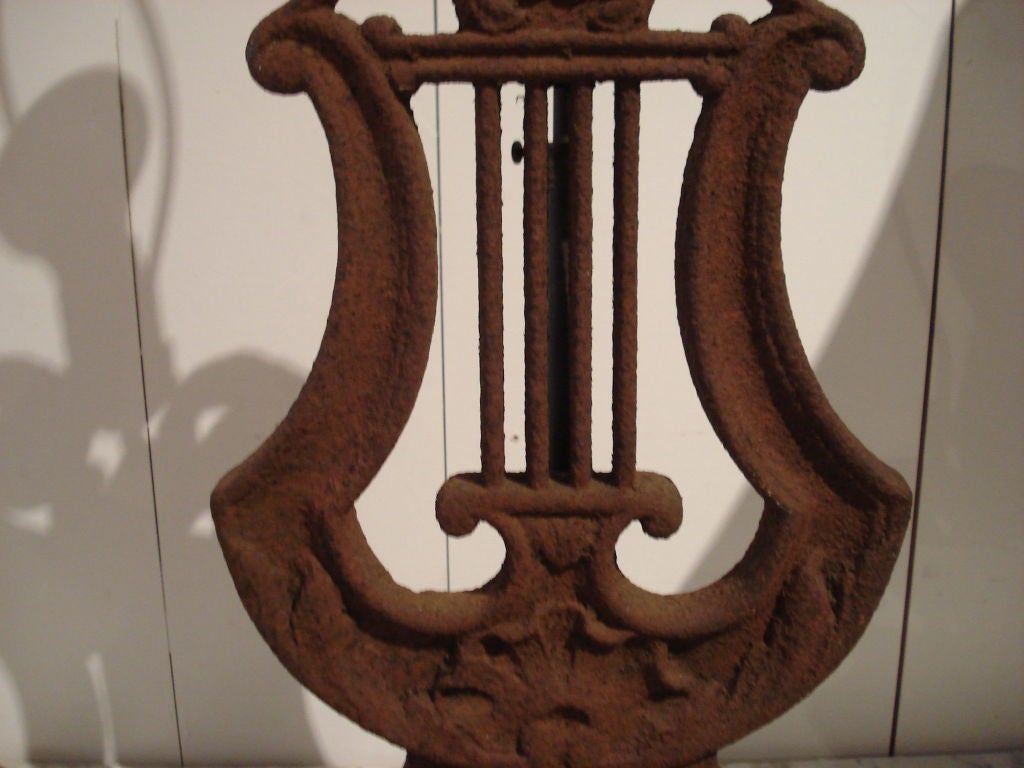 American Pair of iron Lyre lamps