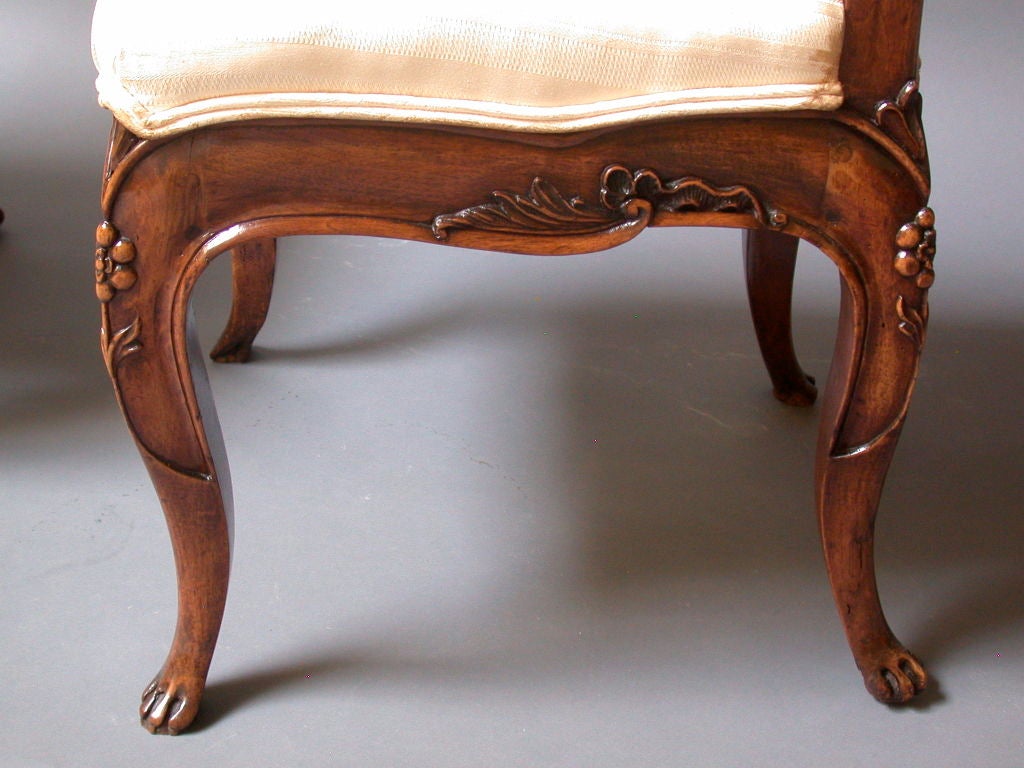 Walnut Remarkable  Pair of 18th Century French Canadian Side Chairs.