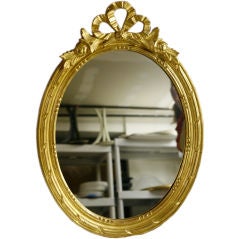 Antique Pair of French Oval Bow Mirrors