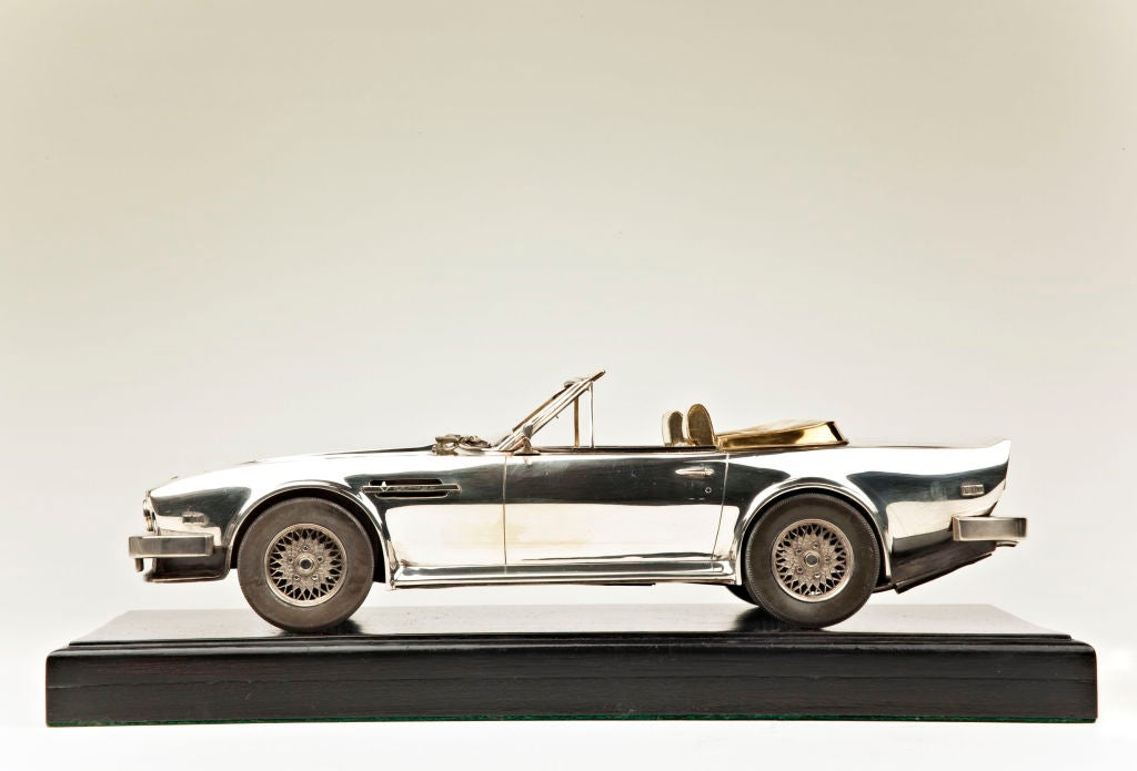 A unique, specially commissioned, exceptionally fine sterling silver and gold model of an Aston Martin V8 Volante 585EFI with U.S. specification left-hand drive.<br />
<br />
The Aston Martin Volante was Britain's first supercar.  It is a