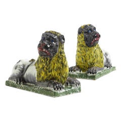UNUSUAL PAIR OF FRENCH FAIENCE LIONS