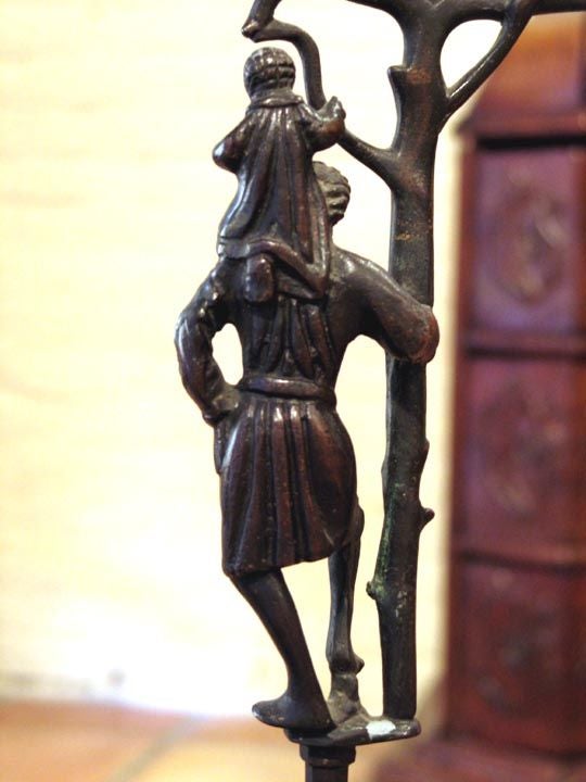 PAIR OF CONTINENTAL RENAISSANCE STYLE FIGURAL CANDLESTICKS