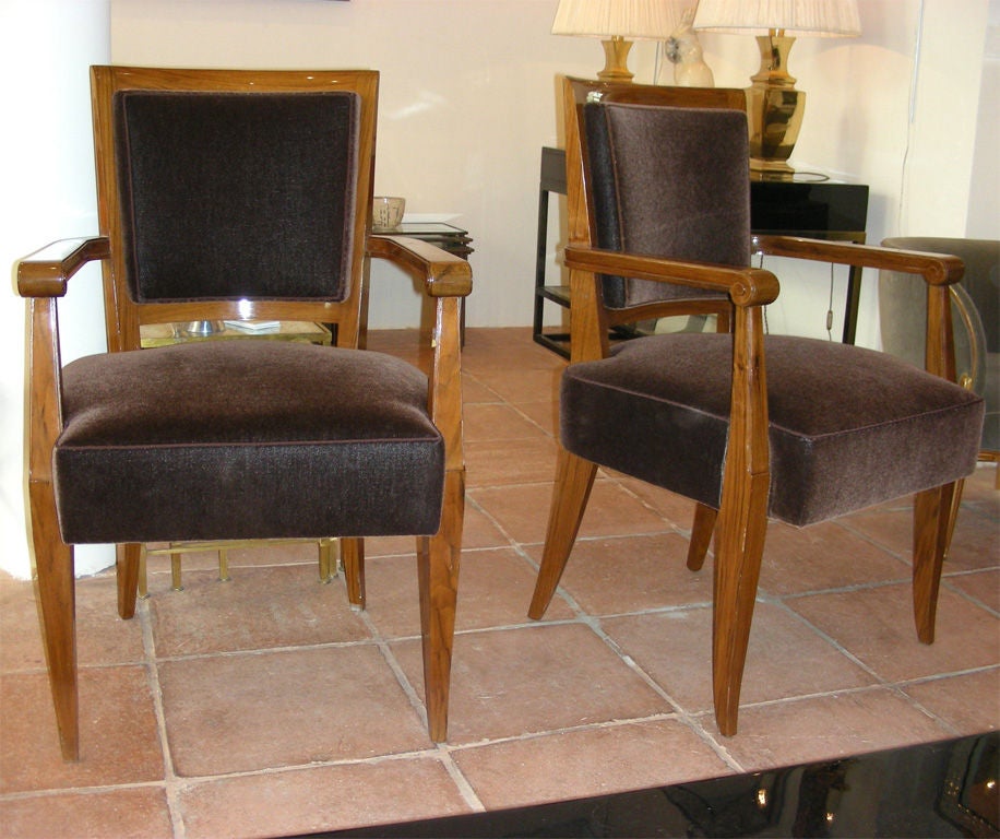 Elegant pair of Bridge armchairs with saber legs by Jean Pascaud in solid rosewood, re-upholstered in dark brown mohair fabric.