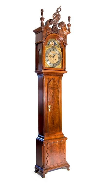 This is an exceptionally rare walnut Chippendale clock we are offering. Less than five have been offered publicly with the original cartouche. We acquired this clock from a private party where it has been for at least three generations.<br />
<br