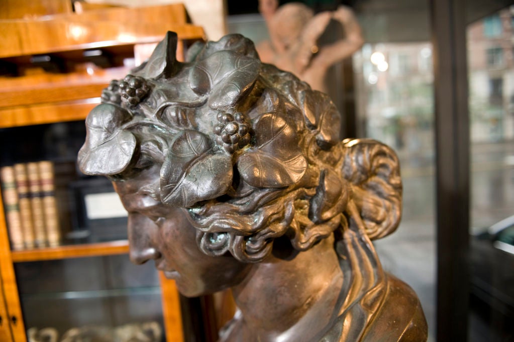 Patinated Bronze Bust of Antinous. A Romantic, over life sized version of Emperor Hadrian's Favourite in the guise of The Greek God Dionysus.