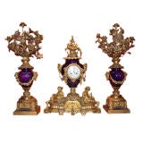 Gilt Bronze and Sevres Porcelain Mantel Clock and Garnitures
